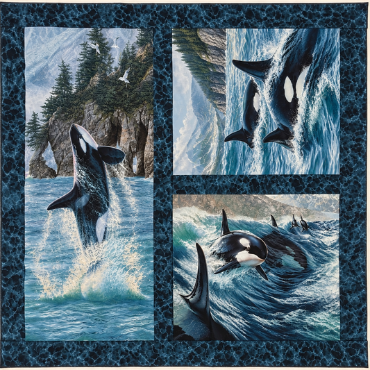 Northcott Naturescapes Voyage orca cotton fabric panel featuring killer whales swimming through blue ocean waves.