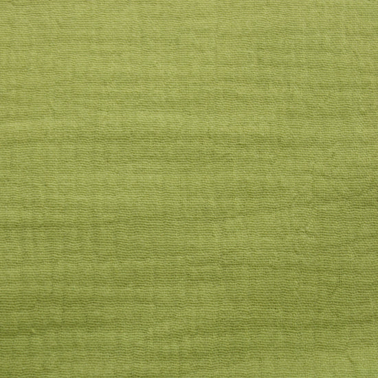 This soft double gauze cotton fabric has a light airy texture with a gently crinkled surface.