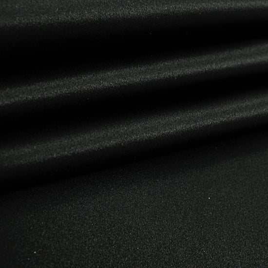 Black satin fabric, smooth polyester satin with soft sheen
