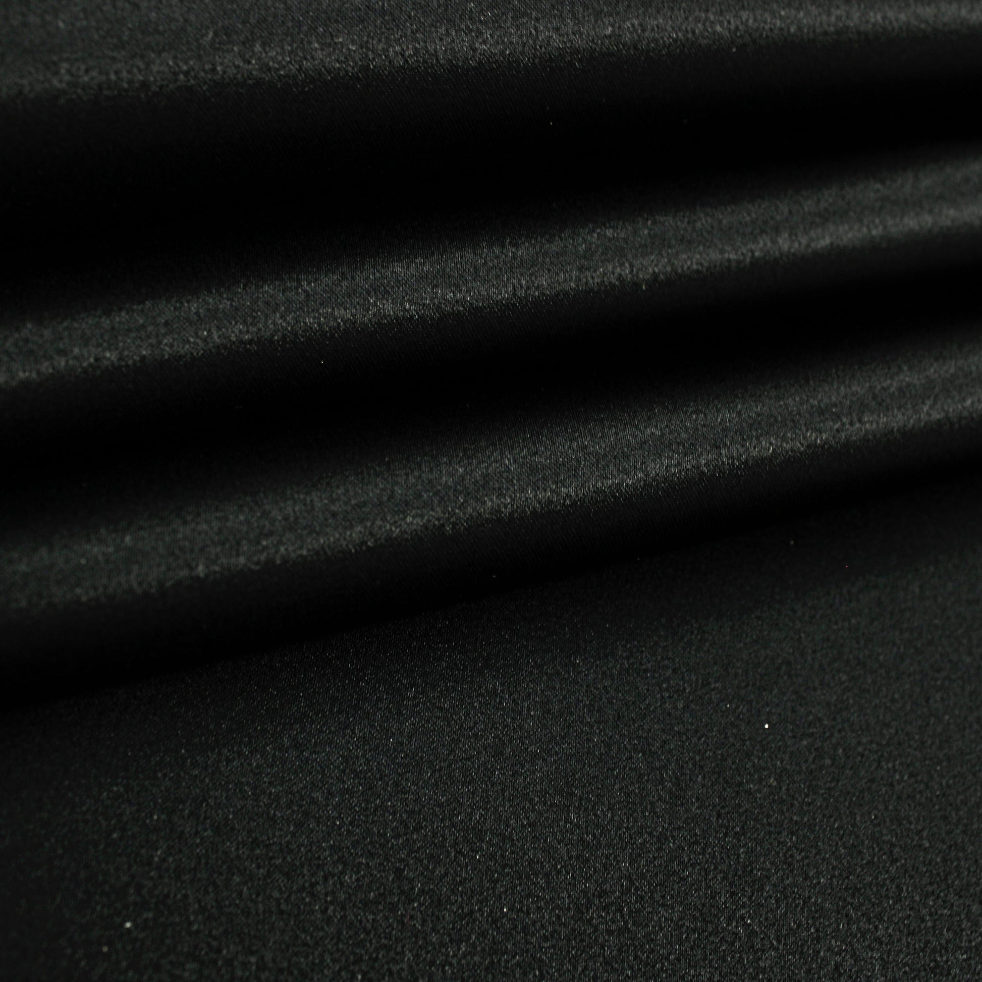 Black satin fabric, smooth polyester satin with soft sheen
