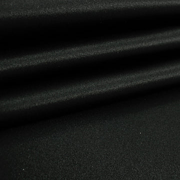 Black satin fabric, smooth polyester satin with soft sheen
