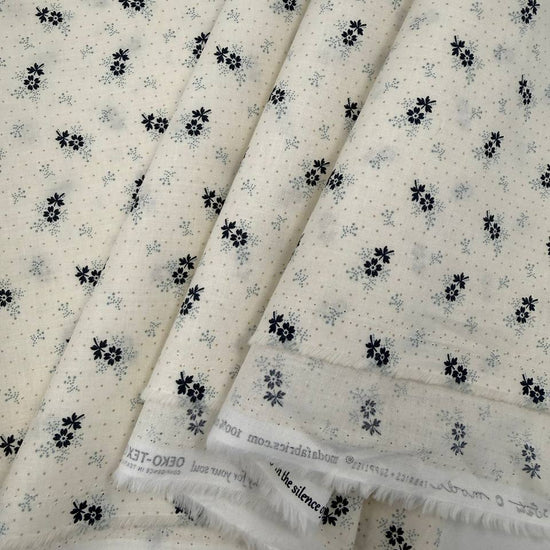 Breathtaking Blues 100% cotton floral fabric by 3 Sisters for Moda, available in Porcelain and Sky.