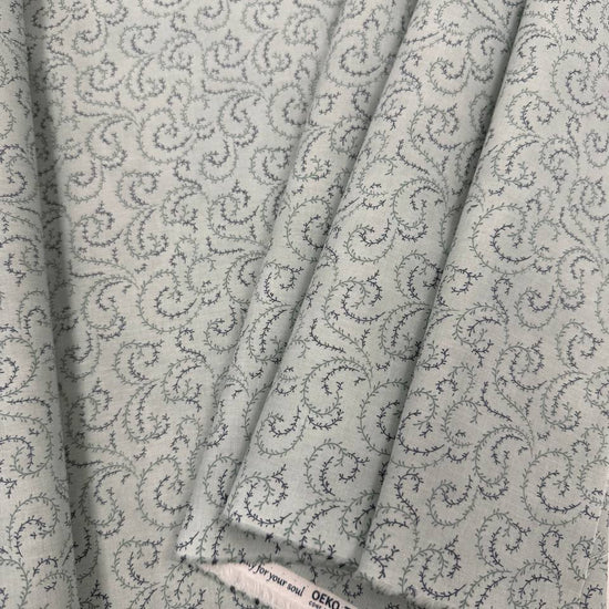 Breathtaking Blues vine swirl 100% cotton fabric by 3 Sisters for Moda, available in Sky and Dusk blue colorways.