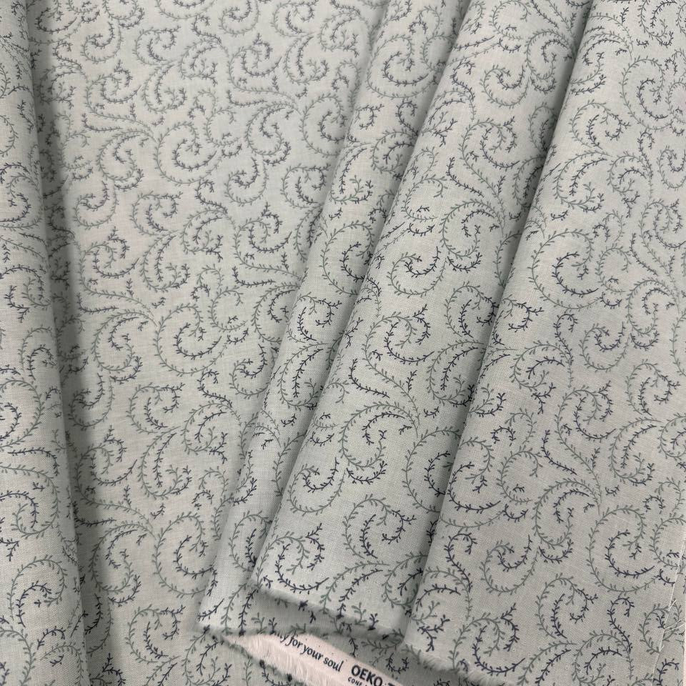 Breathtaking Blues vine swirl 100% cotton fabric by 3 Sisters for Moda, available in Sky and Dusk blue colorways.