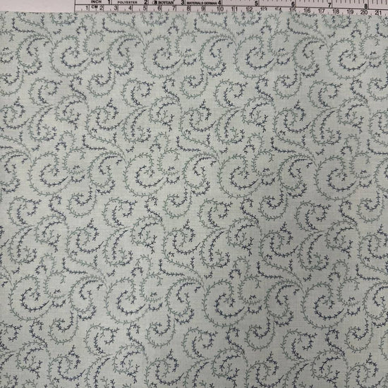 Breathtaking Blues vine swirl 100% cotton fabric by 3 Sisters for Moda, available in Sky and Dusk blue colorways.