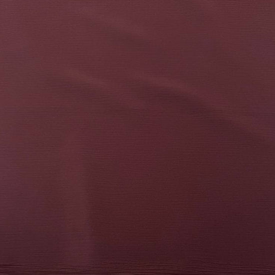 100% polyester crepe fabric, 150 cm wide, available in multiple solid colors.