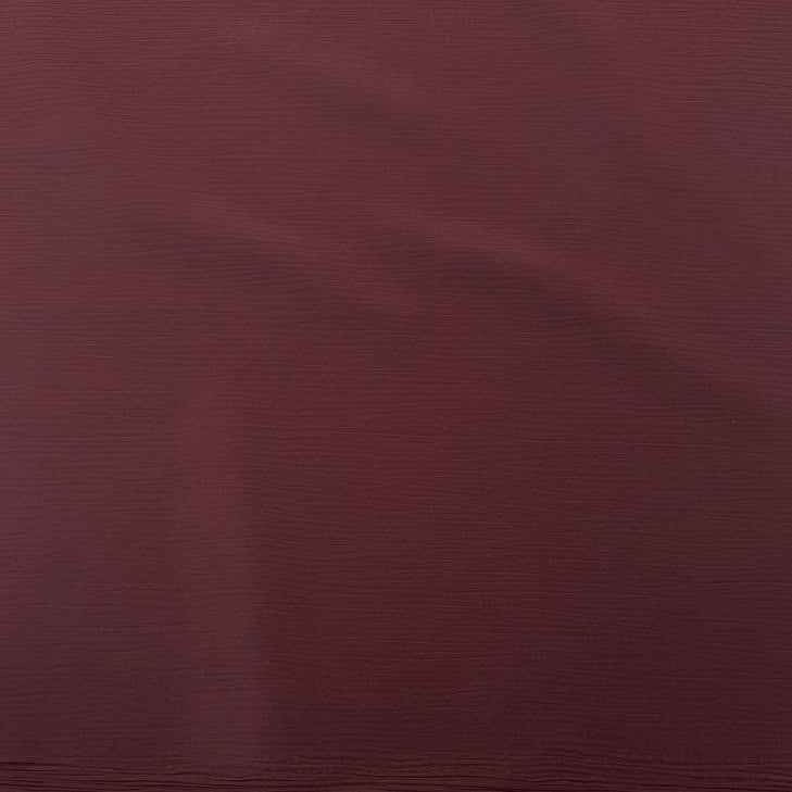 100% polyester crepe fabric, 150 cm wide, available in multiple solid colors.