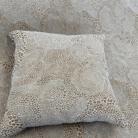 Beige and cream Cloud upholstery fabric with an organic textured pattern, suitable for pillows, cushions, furniture upholstery, and home décor.