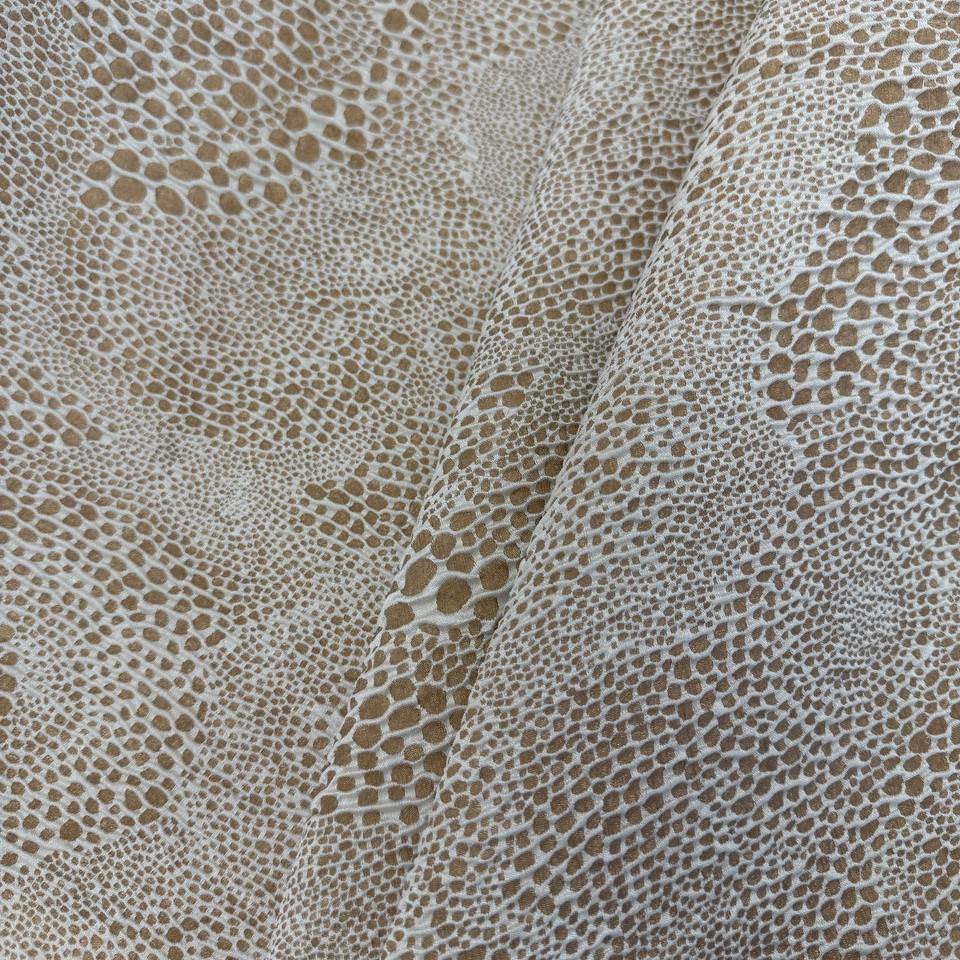 Beige and cream Cloud upholstery fabric with an organic textured pattern, suitable for pillows, cushions, furniture upholstery, and home décor.