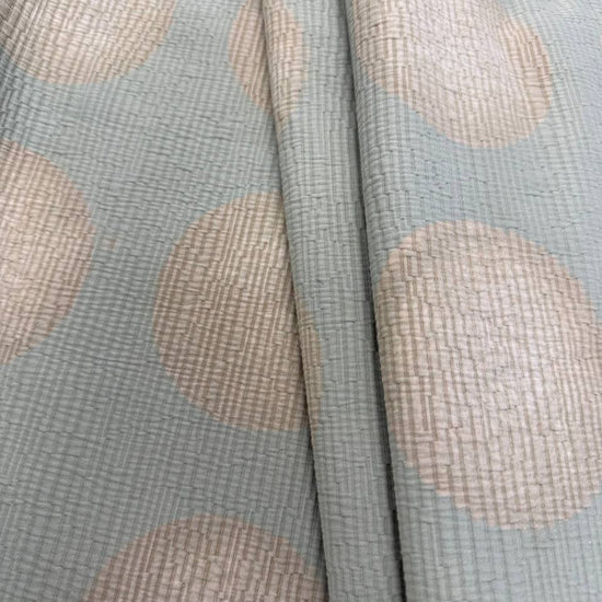 Sage green Haven Jacquard upholstery fabric with large beige circle pattern, woven texture, 73% cotton and 27% polyester