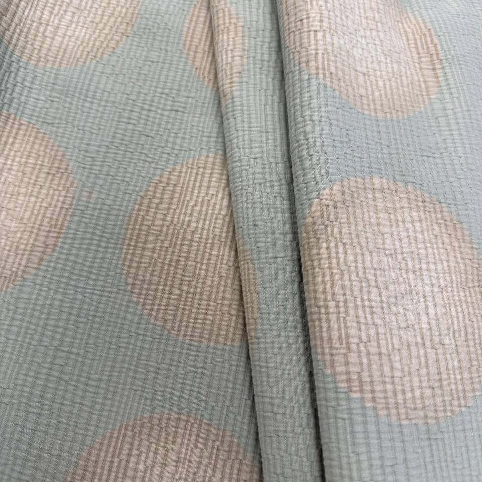 Sage green Haven Jacquard upholstery fabric with large beige circle pattern, woven texture, 73% cotton and 27% polyester