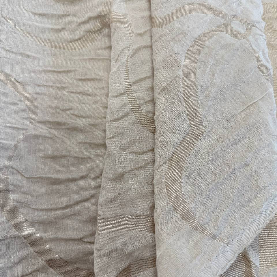 Double-sided beige and cream Cloud upholstery fabric with a textured abstract pattern and reversible design, suitable for cushions, pillows, furniture upholstery, and home décor.