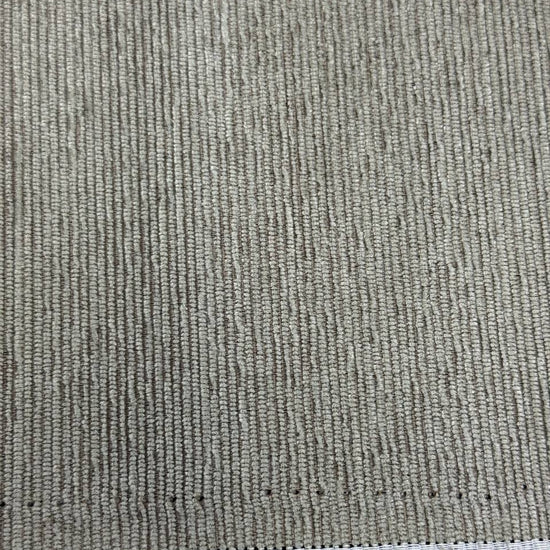 Taupe grey textured upholstery fabric with a raised vertical woven pattern for home décor and furniture projects.