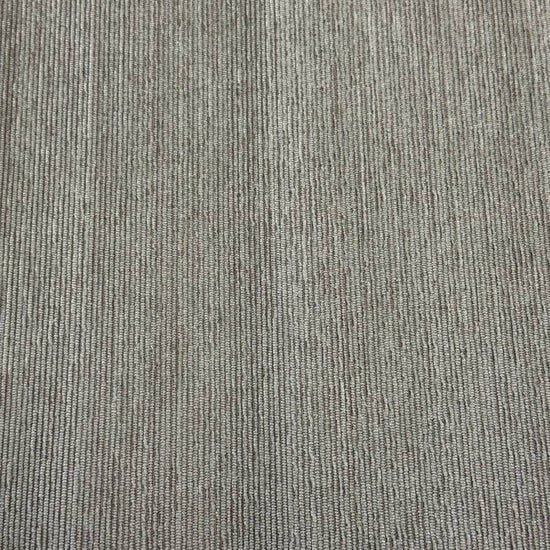 Taupe grey textured upholstery fabric with a raised vertical woven pattern for home décor and furniture projects.