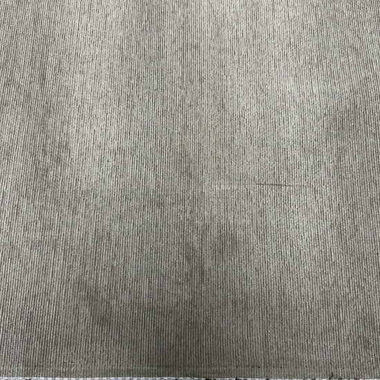 Muted sage green home décor fabric with a fine vertical ribbed texture and subtle grey undertones.