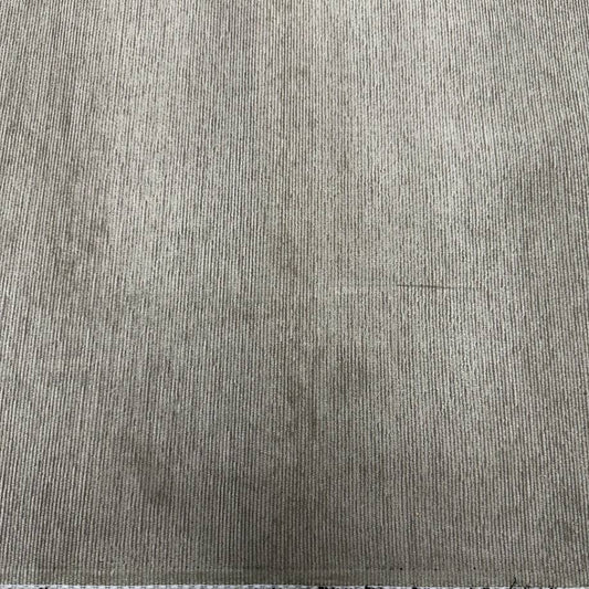 Muted sage green home décor fabric with a fine vertical ribbed texture and subtle grey undertones.