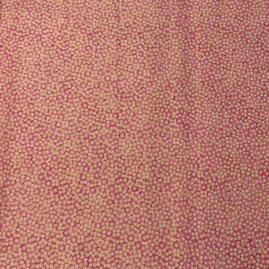 Abstract dotted fabric with a dense textured pattern and organic allover design, suitable for quilting, apparel, and craft sewing projects.