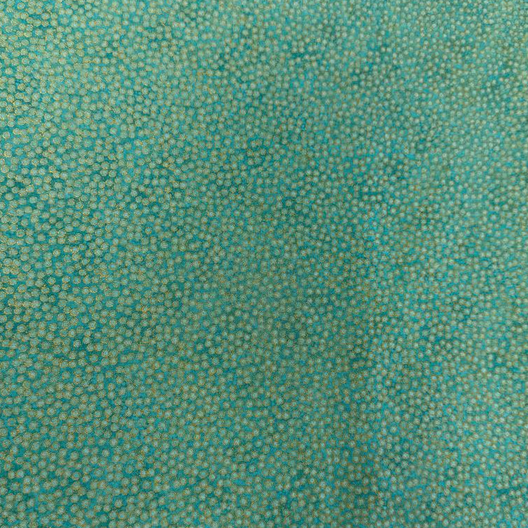 Abstract dotted fabric with a dense textured pattern and organic allover design, suitable for quilting, apparel, and craft sewing projects.