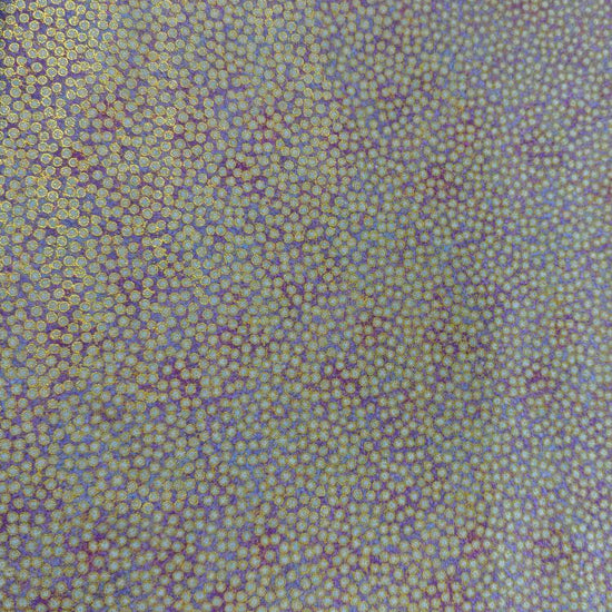 Abstract dotted fabric with a dense textured pattern and organic allover design, suitable for quilting, apparel, and craft sewing projects.