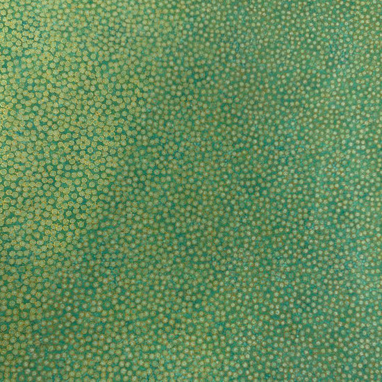 Abstract dotted fabric with a dense textured pattern and organic allover design, suitable for quilting, apparel, and craft sewing projects.