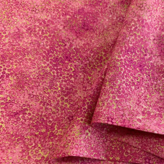 Abstract bubble texture fabric with distressed organic pattern and metallic-style detailing.