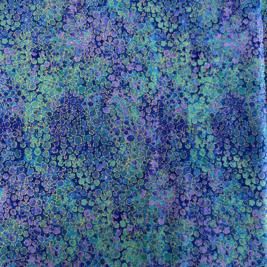 Fabric with an abstract all-over circular bubble pattern in mixed sizes and textured detailing.
