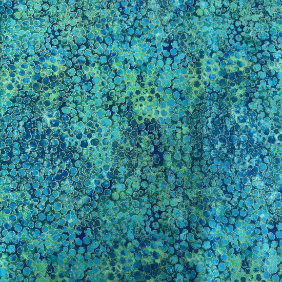 Fabric with an abstract all-over circular bubble pattern in mixed sizes and textured detailing.