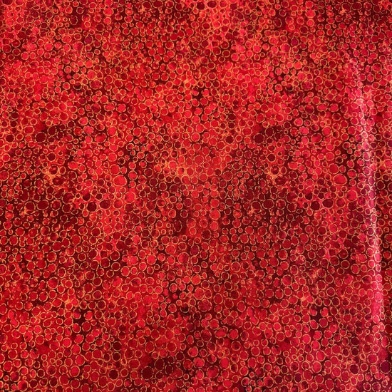 Fabric with an abstract all-over circular bubble pattern in mixed sizes and textured detailing.