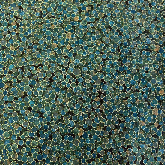 Fabric featuring an abstract all-over pattern of layered circular bubble motifs in varying sizes with a textured artistic design.