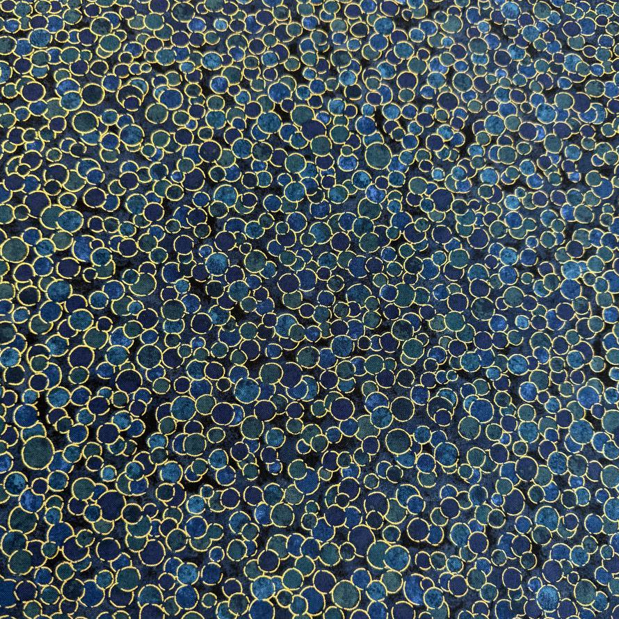 Fabric featuring an abstract all-over pattern of layered circular bubble motifs in varying sizes with a textured artistic design.