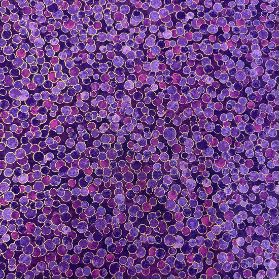 Fabric featuring an abstract all-over pattern of layered circular bubble motifs in varying sizes with a textured artistic design.