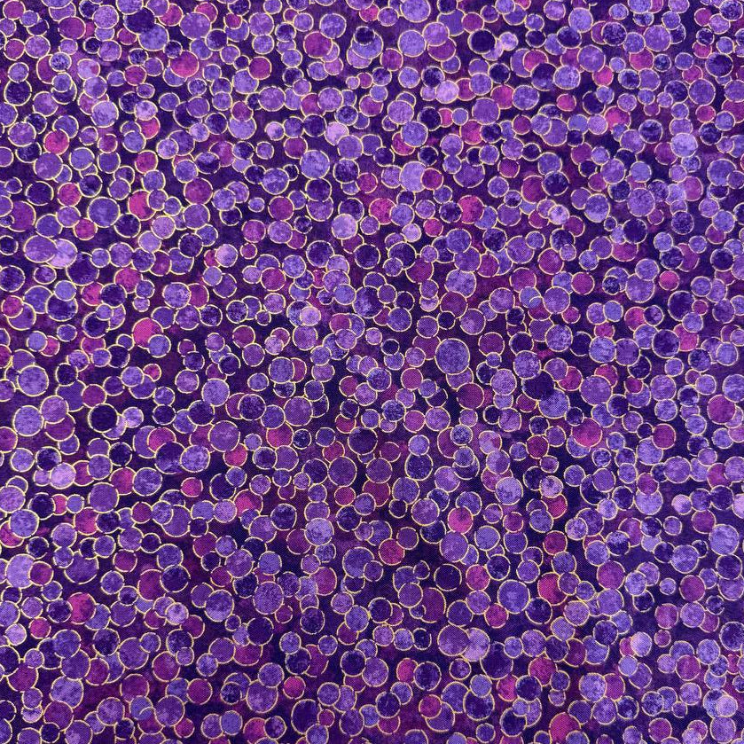 Fabric featuring an abstract all-over pattern of layered circular bubble motifs in varying sizes with a textured artistic design.