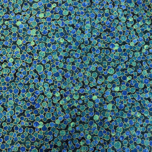 Fabric featuring an abstract all-over pattern of layered circular bubble motifs in varying sizes with a textured artistic design.