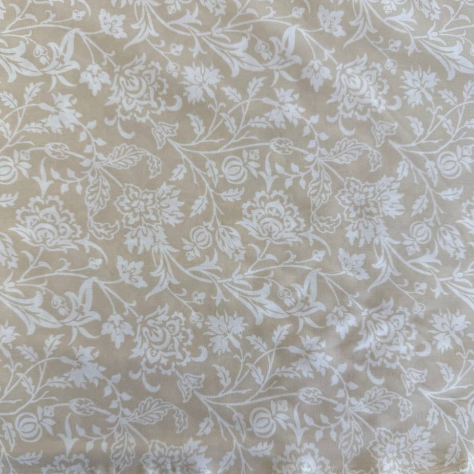 Extra wide Moda Agatha Road quilt backing fabric with elegant white floral vine pattern on neutral background