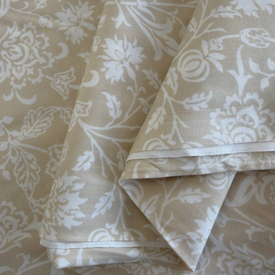 Extra wide Moda Agatha Road quilt backing fabric with elegant white floral vine pattern on neutral background