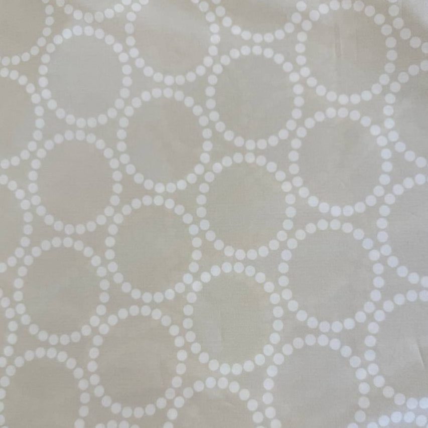 Extra wide Moda Love Letter quilt backing fabric with white geometric pearl circle pattern on neutral background.