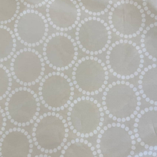 Extra wide Moda Love Letter quilt backing fabric with white geometric pearl circle pattern on neutral background.
