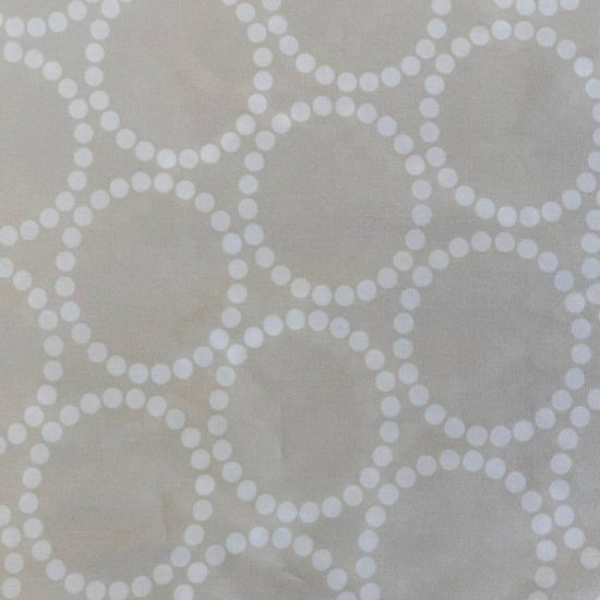 Extra wide Moda Love Letter quilt backing fabric with white geometric pearl circle pattern on neutral background.
