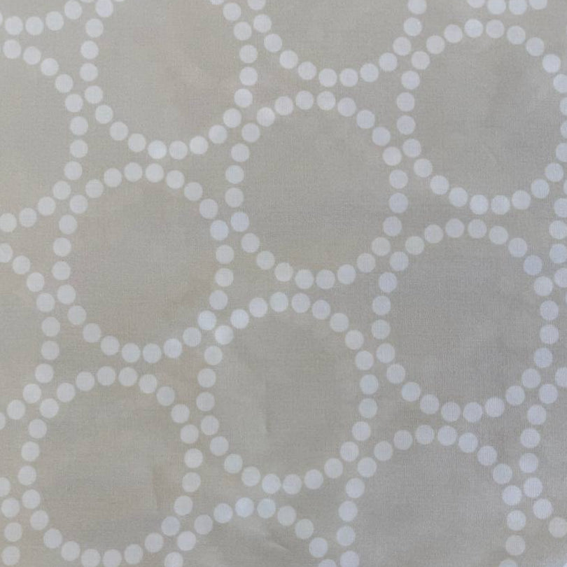 Extra wide Moda Love Letter quilt backing fabric with white geometric pearl circle pattern on neutral background.