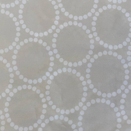 Extra wide Moda Love Letter quilt backing fabric with white geometric pearl circle pattern on neutral background.