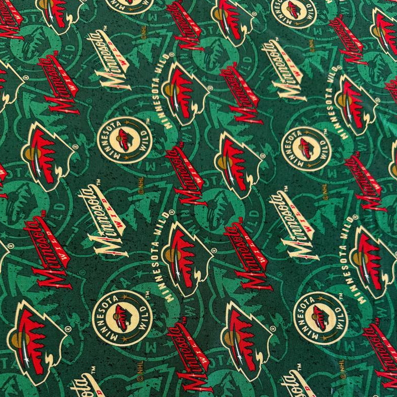 Licensed Minnesota Wild NHL cotton fabric with repeating team logos and hockey-themed print on cotton fabric.