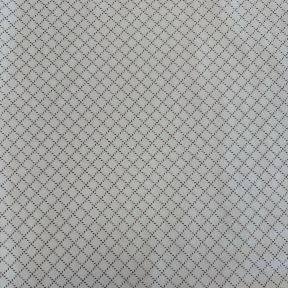 Prairie Gatherings cotton flannel fabric by Primitive Gatherings for Moda Fabrics featuring a small diamond geometric print, available in warm neutral and blue color variations.