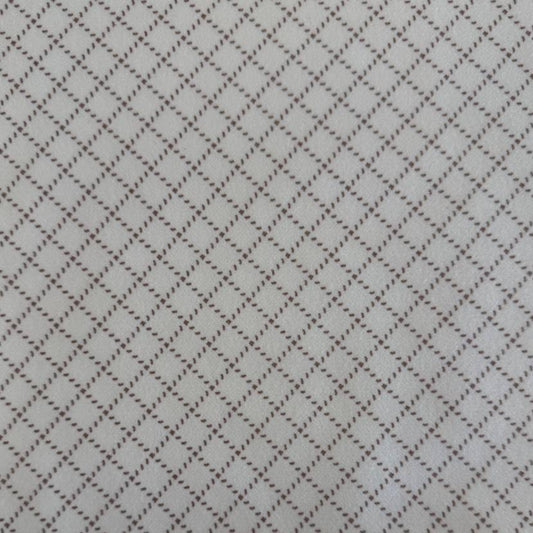 Prairie Gatherings cotton flannel fabric by Primitive Gatherings for Moda Fabrics featuring a small diamond geometric print, available in warm neutral and blue color variations.