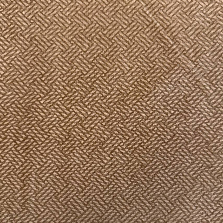 Prairie Gatherings 108 inch cotton flannel fabric by Primitive Gatherings for Moda Fabrics featuring a woven-style geometric print, available in warm tan and soft grey color variations.