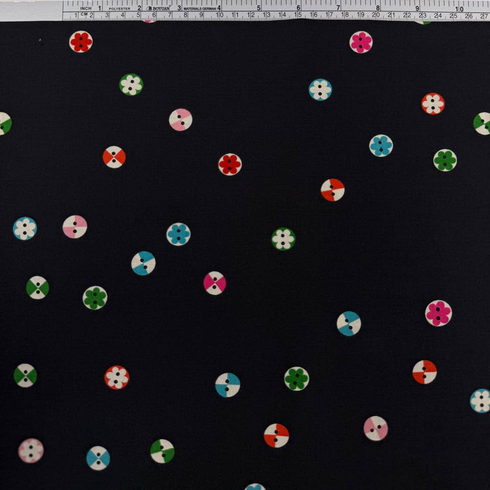 Moda 1800 Notion RS5208-17 Soft Black 100% cotton fabric by Ruby Star Society featuring colorful small button and floral motifs on a black background.