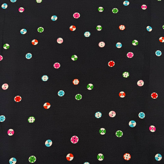 Moda 1800 Notion RS5208-17 Soft Black 100% cotton fabric by Ruby Star Society featuring colorful small button and floral motifs on a black background.