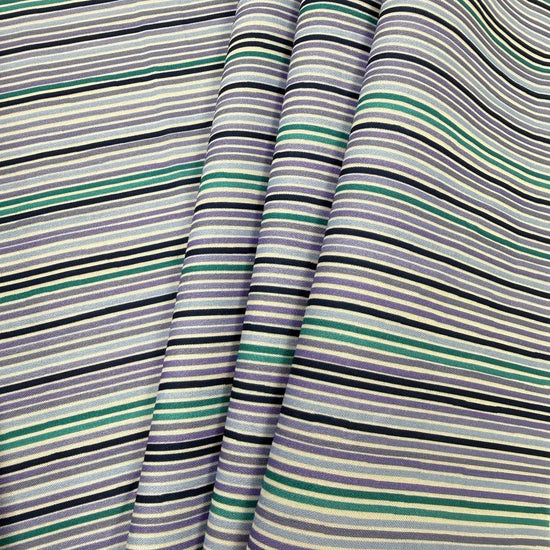 Lilac Lavender by STOF 100% cotton fabric with horizontal lilac, lavender, teal, navy, blue and white stripes.