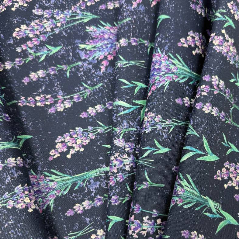 Lilac Lavender by STOF 100% cotton fabric with purple and lilac lavender flowers and green leaves on a deep navy blue background.