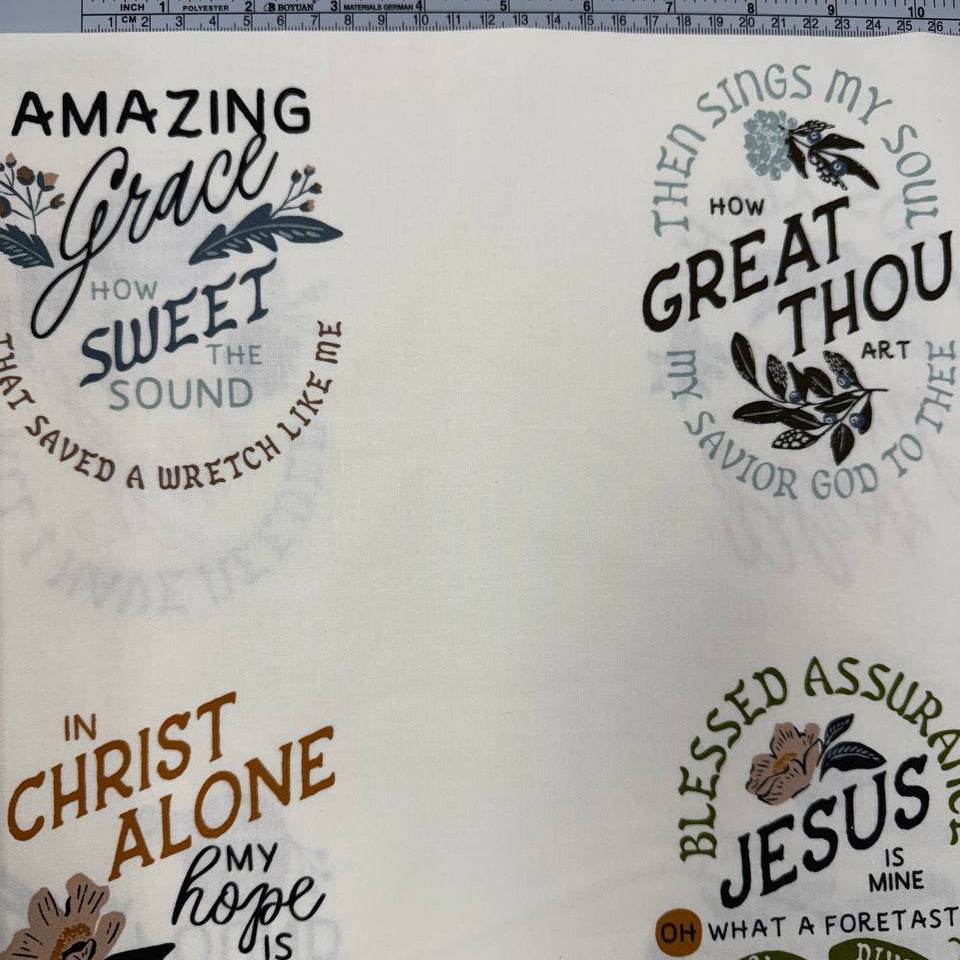 Wellspring by Fancy That Design House for Moda 100% cotton fabric with Christian inspirational and hymn phrases, floral accents and multicolor typography on a cream background.