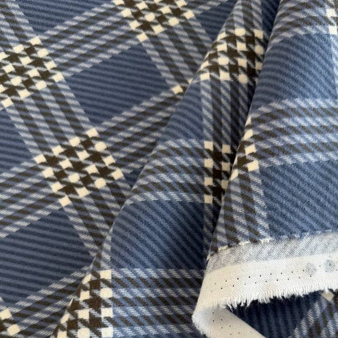 Prairie Gatherings cotton flannel fabric featuring a classic plaid pattern by Primitive Gatherings for Moda Fabrics.